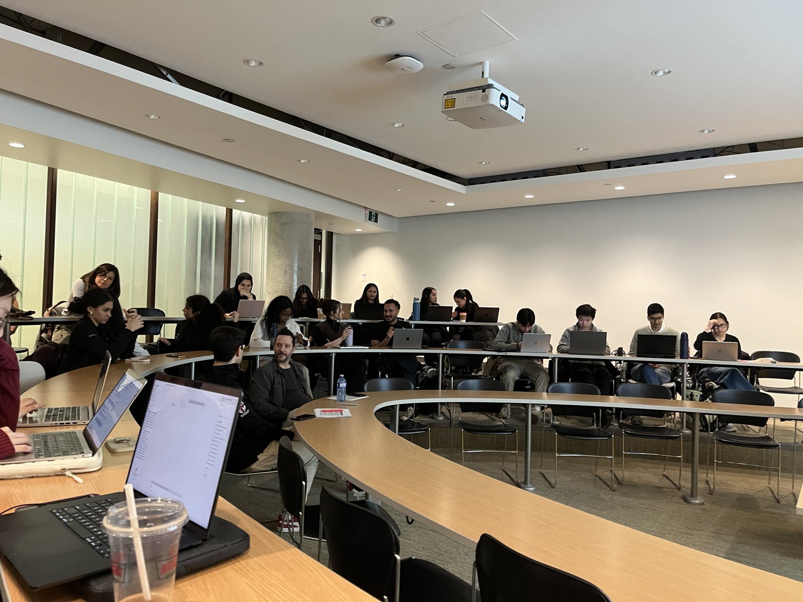 Students and judges seated in the lecture room before pitches begin